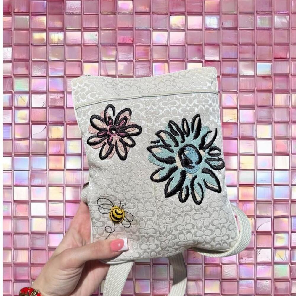 Rare coach white floral bee